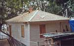 New Roof & Siding, Original Door & Window Openings Restored